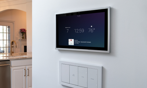 Control4 T5 touchscreen mounted on a wall